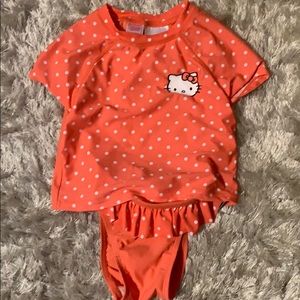 Peach hello Kitty two piece swim suit .